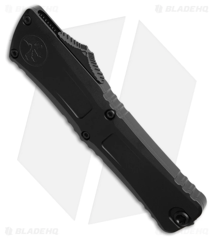 Microtech Combat Troodon D/E Gen III OTF Knife Black Al (4" Black Full Serr) 2 Microtech Combat Troodon D/E Gen III OTF Knife Black Al (4" Black Full Serr) - Image 2