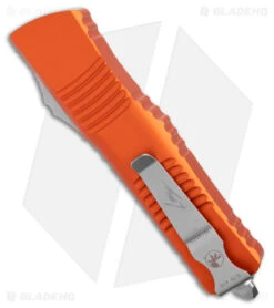 Microtech Combat Troodon Hellhound Signature Series OTF Knife Orange (3.8" SW) 6 Microtech Combat Troodon Hellhound Signature Series OTF Knife Orange (3.8" SW) -Microtech Microtech Combat Troodon Hellhound Signature Series OTF Orange SW BHQ 176943 jr side