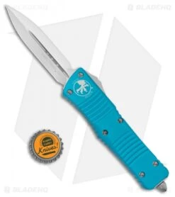 Microtech Combat Troodon D/E OTF Automatic Knife Turquoise (3.8" Satin) 142-4TQ 7 Microtech Combat Troodon D/E OTF Automatic Knife Turquoise (3.8" Satin) 142-4TQ -Microtech Microtech Combat Troodon OTF DE Dagger Turquoise Satin 142 4TQ BHQ 98085 jr bottlecap