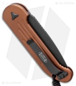 Microtech LUDT Automatic Knife Tan (3.4" Black) 135-1TA 6 Microtech LUDT Automatic Knife Tan (3.4" Black) 135-1TA -Microtech Microtech LUDT Automatic Knife Tan 3.4 Black135 1TA BHQ 8566 LS Side