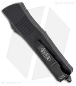 Microtech Troodon D/E OTF Automatic Knife Tactical (3" Black Full Serr) 138-3T 6 Microtech Troodon D/E OTF Automatic Knife Tactical (3" Black Full Serr) 138-3T -Microtech Microtech Troodon OTF Auto Black Tactical Dagger 138 3T BHQ 11847 ns side