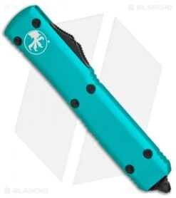 Microtech Ultratech D/E OTF Automatic Knife Turquoise CC (3.4" Black Serr) 5 Microtech Ultratech D/E OTF Automatic Knife Turquoise CC (3.4" Black Serr) -Microtech Microtech Ultratech DE turquoise CC black serr BHQ 68756 er spine